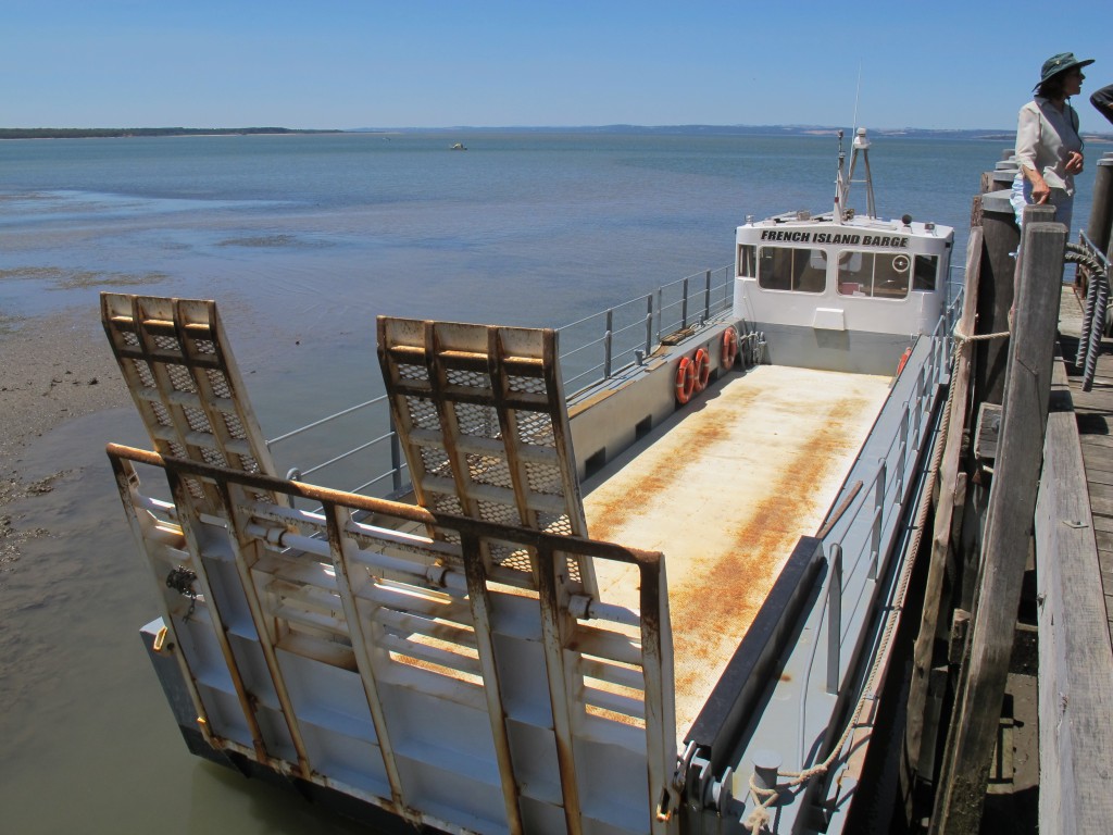 The barge which depends on high tide to be able to get out of or on French Island, one of the many headaches locals have to contend with.